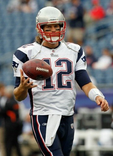 FOXBORO, MA - SEPTEMBER 12: Quarterback Tom Brady #12 prepares for a drill before the NFL season opener against the Cincinnati Bengals at Gillette Stadium on September 12, 2010 in Foxboro, Massachusetts. <br /><br /><span class="help">(Photo by Jim Rogash/Getty Images)</span>