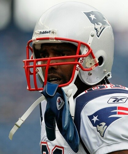 FOXBORO, MA - SEPTEMBER 12: Randy Moss #81 of the New England Patriots looks for a signal before the NFL season opener against the Cincinnati Bengals at Gillette Stadium on September 12, 2010 in Foxboro, Massachusetts. <br /><br /><span class="help">(Photo by Jim Rogash/Getty Images)</span>
