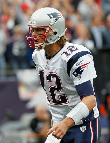 FOXBORO, MA - SEPTEMBER 12: Quarterback Tom Brady #12 reacts after teammate Wes Welker #83 scored a touchdown in the first quarter during the NFL season opener against the Cincinnati Bengals at Gillette Stadium on September 12, 2010 in Foxboro, Massachusetts. <br /><br /><span class="help">(Photo by Jim Rogash/Getty Images)</span>