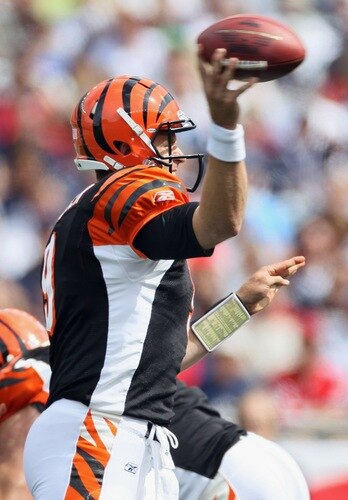 FOXBORO, MA - SEPTEMBER 12:  Carson Palmer #9 of the Cincinnati Bengals passes the ball in the first half against the New England Patriots during the NFL season opener on September 12, 2010 at Gillette Stadium in Foxboro, Massachusetts.  <br /><br /><span class="help">(Photo by Elsa/Getty Images)</span>