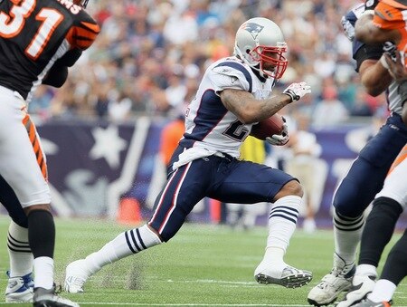 FOXBORO, MA - SEPTEMBER 12:  Fred Taylor #21 of the New England Patriots carries the ball in the first quarter against the Cincinnati Bengals during the NFL season opener on September 12, 2010 at Gillette Stadium in Foxboro, Massachusetts.  <br /><br /><span class="help">(Photo by Elsa/Getty Images)</span>