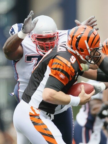 FOXBORO, MA - SEPTEMBER 12:  Vince Wilfork #75 of the New England Patriots sacks Carson Palmer #9 of the Cincinnati Bengals during the NFL season opener on September 12, 2010 at Gillette Stadium in Foxboro, Massachusetts.  <br /><br /><span class="help">(Photo by Elsa/Getty Images)</span>