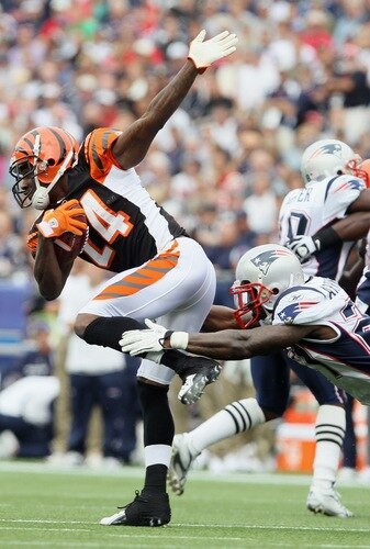 FOXBORO, MA - SEPTEMBER 12:  Adam Jones #24 of the Cincinnati Bengals tries to avoid Kyle Arrington #27 of the New England Patriots during the NFL season opener on September 12, 2010 at Gillette Stadium in Foxboro, Massachusetts.  <br /><br /><span class="help">(Photo by Elsa/Getty Images)</span>