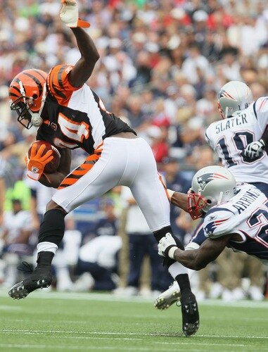 FOXBORO, MA - SEPTEMBER 12:  Adam Jones #24 of the Cincinnati Bengals tries to avoid Kyle Arrington #27 of the New England Patriots during the NFL season opener on September 12, 2010 at Gillette Stadium in Foxboro, Massachusetts.  <br /><br /><span class="help">(Photo by Elsa/Getty Images)</span>