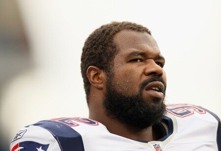 FOXBORO, MA - SEPTEMBER 12:  Gerard Warren #92 of the New England Patriots looks on before the game against the Cincinnati Bengals during the NFL season opener on September 12, 2010 at Gillette Stadium in Foxboro, Massachusetts.  <br /><br /><span class="help">(Photo by Elsa/Getty Images)</span>