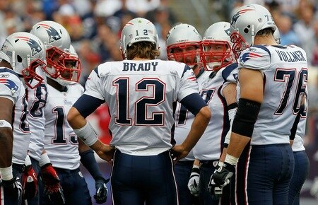 FOXBORO, MA - SEPTEMBER 12: Quarterback Tom Brady #12  of the New England Patriots hurdles with the offense during the NFL season opener against the Cincinnati Bengals at Gillette Stadium on September 12, 2010 in Foxboro, Massachusetts. <br /><br /><span class="help">(Photo by Jim Rogash/Getty Images)</span>