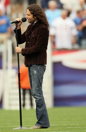 FOXBORO, MA - SEPTEMBER 12:  Constantine Maroulis sings the national anthem before the game between the Cincinnati Bengals and the New England Patriots during the NFL season opener on September 12, 2010 at Gillette Stadium in Foxboro, Massachusetts.  <br /><br /><span class="help">(Photo by Elsa/Getty Images)</span>