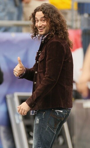 FOXBORO, MA - SEPTEMBER 12:  Constantine Maroulis sings the national anthem before the game between the Cincinnati Bengals and the New England Patriots during the NFL season opener on September 12, 2010 at Gillette Stadium in Foxboro, Massachusetts.  <br /><br /><span class="help">(Photo by Elsa/Getty Images)</span>