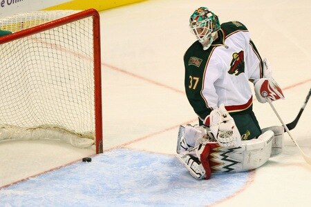ST. LOUIS - SEPTEMBER 24: Josh Harding #37 of the Minnesota Wild lets the puck get past him before having it cleared away by a defenseman against the St. Louis Blues  during a pre-season game at the Scottrade Center on September 24, 2010 in St. Louis, Missouri.  <br /><br /><span class="help">(Photo by Dilip Vishwanat/Getty Images)</span>