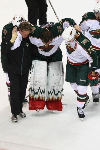 ST. LOUIS - SEPTEMBER 24: Josh Harding #37 of the Minnesota Wild is helped off the ice after being injured against the St. Louis Blues  during a pre-season game at the Scottrade Center on September 24, 2010 in St. Louis, Missouri.  <br /><br /><span class="help">(Photo by Dilip Vishwanat/Getty Images)</span>