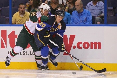 ST. LOUIS - SEPTEMBER 24: Alex Steen #20 of the St. Louis Blues controls the puck against Antti Miettinen #20 of the Minnesota Wild during a pre-season game at the Scottrade Center on September 24, 2010 in St. Louis, Missouri.  <br /><br /><span class="help">(Photo by Dilip Vishwanat/Getty Images)</span>