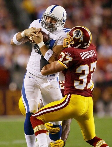 LANDOVER, MD - OCTOBER 17: Dallas Clark #44 of the Indianapolis Colts makes a catch against Reed Daughty #37 of the Washington Redskins in second quarter action at FedExField on October 17, 2010 in Landover, Maryland.  <br /><br /><span class="help">(Photo by Win McNamee/Getty Images)</span>