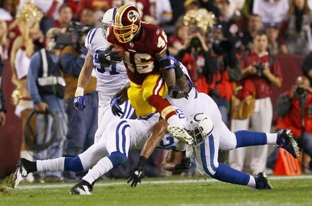 LANDOVER, MD - OCTOBER 17:  Running back Ryan Torain #46 of the Washington Redskins is gang tackled by the Indianapolis Colts defense at FedExField on October 17, 2010 in Landover, Maryland.  <br /><br /><span class="help">(Photo by Win McNamee/Getty Images)</span>