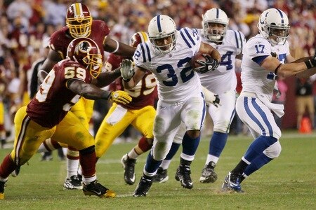 LANDOVER, MD - OCTOBER 17:  Running back Mike Hart #32 of the Indianapolis Colts is tackled by London Fletcher #59 of the Washington Redskins at FedEx Field on October 17, 2010 in Landover, Maryland. The Colts won the game 27-24.  <br /><br /><span class="help">(Photo by Win McNamee/Getty Images)</span>