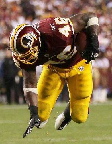LANDOVER, MD - OCTOBER 17:  Ryan Torain #46 of the Washington Redskins goes airborn while eluding a tackler against the Indianapolis Colts at FedExField on October 17, 2010 in Landover, Maryland. The Colts won the game 27-24.  <br /><br /><span class="help">(Photo by Win McNamee/Getty Images)</span>