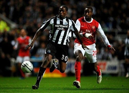 NEWCASTLE, UNITED KINGDOM - OCTOBER 27:   Nile Ranger of Newcastle United competes with Johan Djourou of Arsenal during the Carling Cup Fourth Round match between Newcastle United and Arsenal at St James' Park on October 27, 2010 in Newcastle, England. <br /><br /><span class="help">(Photo by Laurence Griffiths/Getty Images)</span>