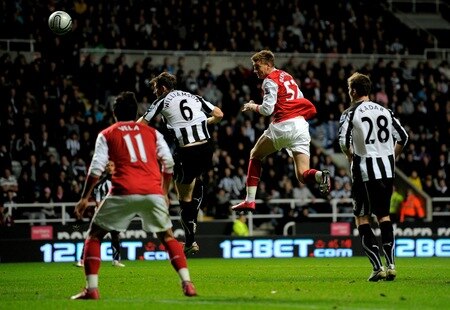 NEWCASTLE UPON TYNE, ENGLAND - OCTOBER 27:  Nicklas Bendtner of Arsenal heads at goal and subsequently scores, following a deflection off Tim Krul of Newcastle United during the Carling Cup Fourth Round match between Newcastle United and Arsenal at St James' Park on October 27, 2010 in Newcastle, England.  <br /><br /><span class="help">(Photo by Michael Regan/Getty Images)</span>