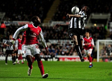 NEWCASTLE UPON TYNE, ENGLAND - OCTOBER 27:  Nile Ranger of Newcastle United controls the ball under pressure from Johan Djourou of Arsenal during the Carling Cup Fourth Round match between Newcastle United and Arsenal at St James' Park on October 27, 2010 in Newcastle, England.  <br /><br /><span class="help">(Photo by Laurence Griffiths/Getty Images)</span>