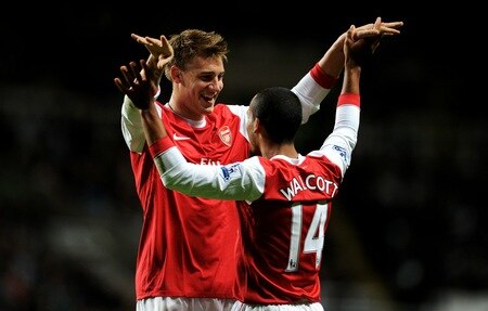 NEWCASTLE UPON TYNE, ENGLAND - OCTOBER 27:  Nicklas Bendtner of Arsenal celebrates the opening goal with team mate Theo Walcott during the Carling Cup Fourth Round match between Newcastle United and Arsenal at St James' Park on October 27, 2010 in Newcastle, England.  <br /><br /><span class="help">(Photo by Michael Regan/Getty Images)</span>