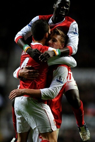 NEWCASTLE UPON TYNE, ENGLAND - OCTOBER 27:  Nicklas Bendtner of Arsenal celebrates scoring his team's third goal with team mates Cesc Fabregas and Emmanuel Eboue during the Carling Cup Fourth Round match between Newcastle United and Arsenal at St James' Park on October 27, 2010 in Newcastle, England.  <br /><br /><span class="help">(Photo by Laurence Griffiths/Getty Images)</span>