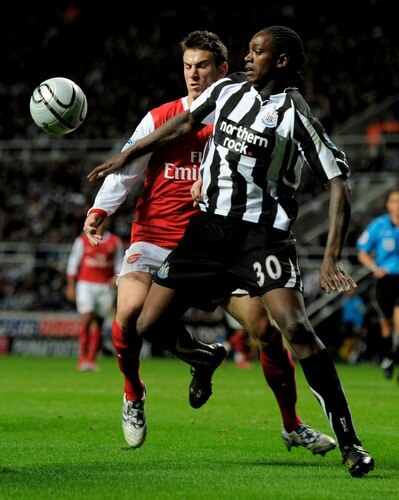 NEWCASTLE UPON TYNE, ENGLAND - OCTOBER 27:  Nile Ranger of Newcastle United competes with Laurent Koscielny of Arsenal during the Carling Cup Fourth Round match between Newcastle United and Arsenal at St James' Park on October 27, 2010 in Newcastle, England.  <br /><br /><span class="help">(Photo by Michael Regan/Getty Images)</span>