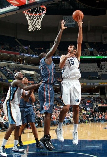 MEMPHIS, TN - DECEMBER 15: Hamed Haddadi #15 of the Memphis Grizzlies shoots over DeSagana Diop #7 of the Charlotte Bobcats on December 15, 2010 at FedExForum in Memphis, Tennessee.  <br /><br /><span class="help">(Photo by Joe Murphy/NBAE via Getty Images)</span>