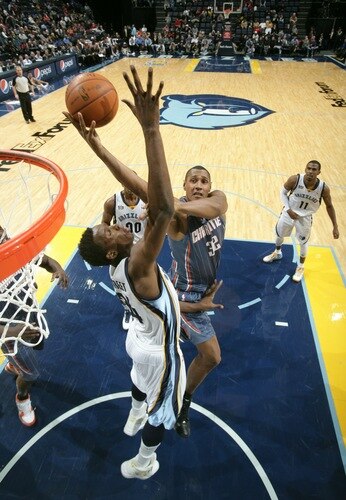 MEMPHIS, TN - DECEMBER 15: Boris Diaw #32 of the Charlotte Bobcats shoots over Hasheem Thabeet #34 of the Memphis Grizzlies on December 15, 2010 at FedExForum in Memphis, Tennessee.  <br /><br /><span class="help">(Photo by Joe Murphy/NBAE via Getty Images)</span>