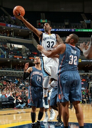 MEMPHIS, TN - DECEMBER 15: O.J. Mayo #32 of the Memphis Grizzlies shoots over Boris Diaw #32 of the Charlotte Bobcats on December 15, 2010 at FedExForum in Memphis, Tennessee.  <br /><br /><span class="help">(Photo by Joe Murphy/NBAE via Getty Images)</span>