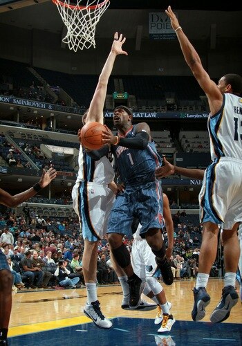 MEMPHIS, TN - DECEMBER 15: Stephen Jackson #1 of the Charlotte Bobcats shoots between Marc Gasol #33 and Xavier Henry #13 of the Memphis Grizzlies on December 15, 2010 at FedExForum in Memphis, Tennessee.  <br /><br /><span class="help">(Photo by Joe Murphy/NBAE via Getty Images)</span>