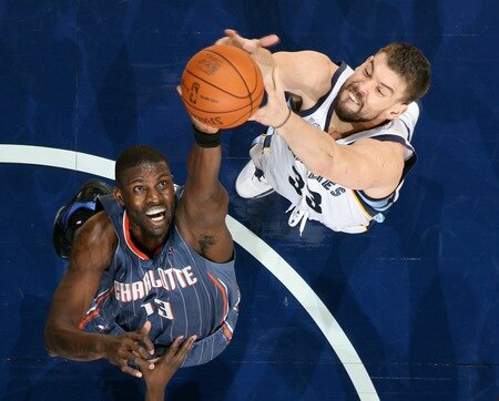 MEMPHIS, TN - DECEMBER 15: Marc Gasol #33 of the Memphis Grizzlies rebounds against Nazr Mohammed #13 of the Charlotte Bobcats on December 15, 2010 at FedExForum in Memphis, Tennessee.  <br /><br /><span class="help">(Photo by Joe Murphy/NBAE via Getty Images)</span>