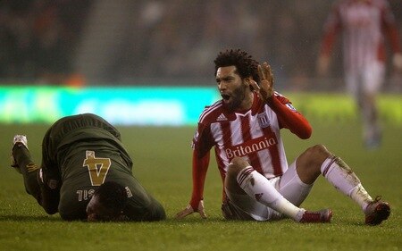 STOKE ON TRENT, ENGLAND - DECEMBER 28:  Jermaine Pennant of Stoke City holds his hand up after a challenge on John Paintsil of Fulham during the Barclays Premier League match between Stoke City and Fulham at Britannia Stadium on December 28, 2010 in Stoke on Trent, England.  <br /><br /><span class="help">(Photo by Clive Brunskill/Getty Images)</span>