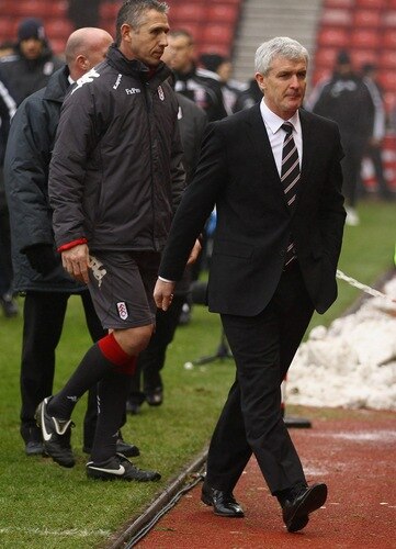 STOKE ON TRENT, ENGLAND - DECEMBER 28:  Fulham manager Mark Hughes walks to his dug out during the Barclays Premier League match between Stoke City and Fulham at Britannia Stadium on December 28, 2010 in Stoke on Trent, England.  <br /><br /><span class="help">(Photo by Clive Brunskill/Getty Images)</span>