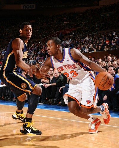 NEW YORK, NY - JANUARY 2: Toney Douglas #23 of the New York Knicks drives to the basket against Danny Granger #33 of the Indiana Pacers during a game on January 2, 2011 at Madison Square Garden in New York City.  <br /><br /><span class="help">(Photo by David Dow/NBAE via Getty Images)</span>