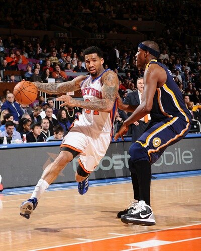 NEW YORK, NY - JANUARY 2: Wilson Chandler #21 of the New York Knicks drives to the basket against James Posey #41 of the Indiana Pacers during a game on January 2, 2011 at Madison Square Garden in New York City.  <br /><br /><span class="help">(Photo by David Dow/NBAE via Getty Images)</span>
