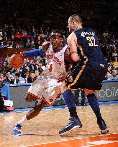 NEW YORK, NY - JANUARY 2: Amar'e Stoudemire #1 of the New York Knicks drives to the basket against Josh McRoberts #32 of the Indiana Pacers during a game on January 2, 2011 at Madison Square Garden in New York City.  <br /><br /><span class="help">(Photo by David Dow/NBAE via Getty Images)</span>