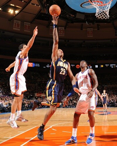 NEW YORK, NY - JANUARY 2: Brandon Rush #25 of the Indiana Pacers shoots against Amar'e Stoudemire #1 and Landry Fields #6 of the New York Knicks during a game on January 2, 2011 at Madison Square Garden in New York City.  <br /><br /><span class="help">(Photo by David Dow/NBAE via Getty Images)</span>