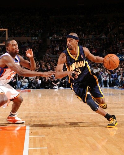 NEW YORK, NY - JANUARY 2: T.J. Ford #5 of the Indiana Pacers drives to the basket against Toney Douglas #23 of the New York Knicks during a game on January 2, 2011 at Madison Square Garden in New York City.  <br /><br /><span class="help">(Photo by David Dow/NBAE via Getty Images)</span>