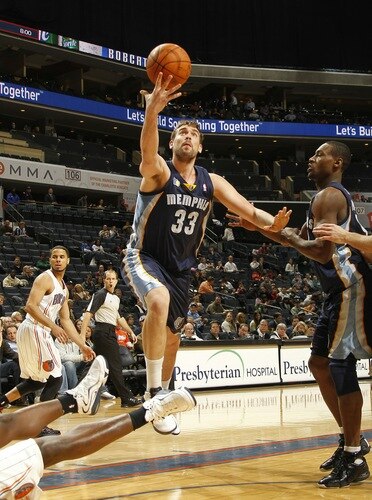 CHARLOTTE, NC - JANUARY 10:  Marc Gasol #33 of the Memphis Grizzlies shoots against Kwame Brown #54 of the Charlotte Bobcats on January 10, 2011 at Time Warner Cable Arena in Charlotte, North Carolina.  <br /><br /><span class="help">(Photo by Kent Smith/NBAE via Getty Images)</span>