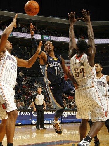 CHARLOTTE, NC - JANUARY 10:  Mike Conley #11 of the Memphis Grizzlies drives the lane against Boris Diaw #32 of the Charlotte Bobcats on January 10, 2011 at Time Warner Cable Arena in Charlotte, North Carolina.  <br /><br /><span class="help">(Photo by Kent Smith/NBAE via Getty Images)</span>