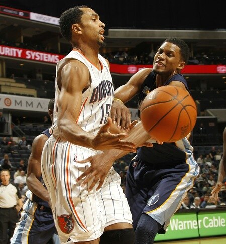 CHARLOTTE, NC - JANUARY 10:  Gerald Henderson #15 of the Charlotte Bobcats gets the pass of against Rudy Gay #22 of the Memphis Grizzlies on January 10, 2011 at Time Warner Cable Arena in Charlotte, North Carolina.  <br /><br /><span class="help">(Photo by Kent Smith/NBAE via Getty Images)</span>