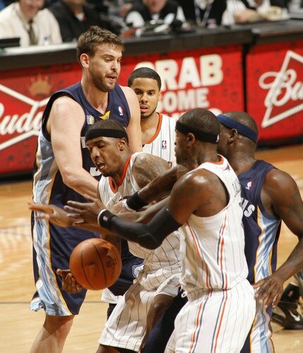 CHARLOTTE, NC - JANUARY 10:  Tyrus Thomas #12 and Stephen Jackson #1 of the Charlotte Bobcats battle for the loose ball during the game against Zack Randolph #50 of the Memphis Grizzlies on January 10, 2011 at Time Warner Cable Arena in Charlotte, North Carolina.  <br /><br /><span class="help">(Photo by Kent Smith/NBAE via Getty Images)</span>