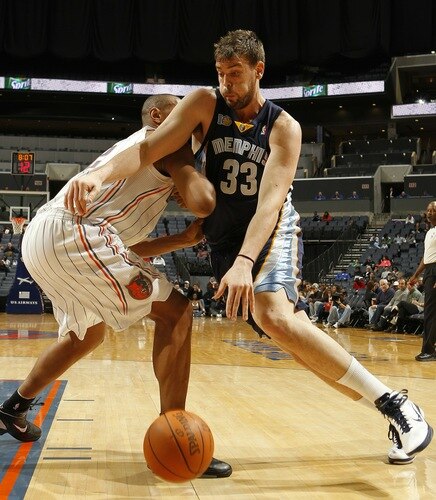CHARLOTTE, NC - JANUARY 10:  Marc Gasol #33 of the Memphis Grizzlies drives to the basket on  Boris Diaw #32 of the Charlotte Bobcats on January 10, 2011 at Time Warner Cable Arena in Charlotte, North Carolina.  <br /><br /><span class="help">(Photo by Kent Smith/NBAE via Getty Images)</span>
