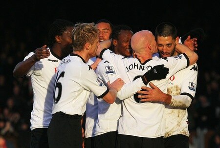 LONDON, ENGLAND - JANUARY 22:  Goalscorer Clint Dempsey (R) of Fulham is kissed by Andrew Johnson during the Barclays Premier League match between Fulham and Stoke City at Craven Cottage on January 22, 2011 in London, England.  <br /><br /><span class="help">(Photo by Clive Rose/Getty Images)</span>