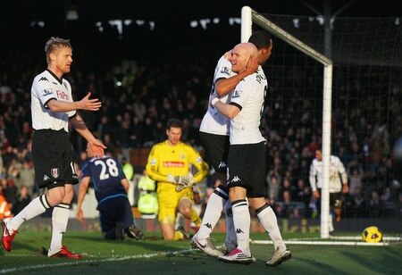LONDON, ENGLAND - JANUARY 22:  Andrew Johnson of Fulham celebrates the goal scored by Clint Dempsey with Mousa Dembele and Damien Duff (L) during the Barclays Premier League match between Fulham and Stoke City at Craven Cottage on January 22, 2011 in London, England.  <br /><br /><span class="help">(Photo by Clive Rose/Getty Images)</span>