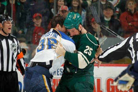SAINT PAUL, MN - FEBRUARY 12: Cam Barker #25 of the Minnesota Wild and Matt D'Agostini #36 of the St. Louis Blues fight during the game at Xcel Energy Center on February 12, 2011 in Saint Paul, Minnesota.  <br /><br /><span class="help">(Photo by Bruce Kluckhohn/NHLI via Getty Images)</span>