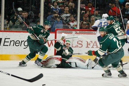 SAINT PAUL, MN - FEBRUARY 12: (L-R) Brent Burns #8, and Niklas Backstrom #32, and Matt Cullen #7 of the Minnesota Wild keep their eyes on the puck as they defend their goal against the St. Louis Blues during the game at Xcel Energy Center on February 12, 2011 in Saint Paul, Minnesota.  <br /><br /><span class="help">(Photo by Bruce Kluckhohn/NHLI via Getty Images)</span>