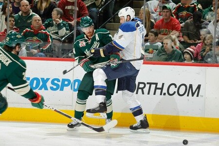 SAINT PAUL, MN - FEBRUARY 12: Martin Havlat #24 of the Minnesota Wild and Eric Brewer #4 of the St. Louis Blues collide during the game at Xcel Energy Center on February 12, 2011 in Saint Paul, Minnesota.  <br /><br /><span class="help">(Photo by Bruce Kluckhohn/NHLI via Getty Images)</span>
