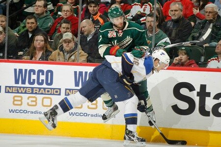 SAINT PAUL, MN - FEBRUARY 12: Matt Cullen #7 of the Minnesota Wild and Jay McClement #18 of the St. Louis Blues collide along the boards during the game at Xcel Energy Center on February 12, 2011 in Saint Paul, Minnesota.  <br /><br /><span class="help">(Photo by Bruce Kluckhohn/NHLI via Getty Images)</span>