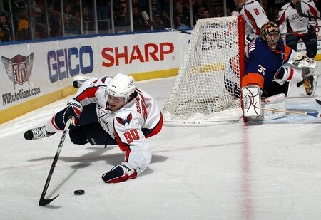 UNIONDALE, NY - FEBRUARY 26: Marcus Johansson #90 of the Washington Capitals gets tripped up in his game against the New York Islanders at the Nassau Coliseum on February 26, 2011 in Uniondale, New York.  <br /><br /><span class="help">(Photo by Bruce Bennett/Getty Images)</span>