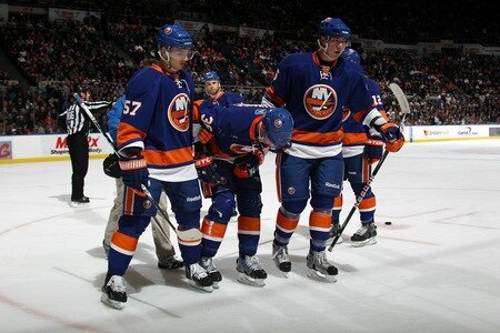 UNIONDALE, NY - FEBRUARY 26:  Travis Hamonic #36 of the New York Islanders leave the ice after being hit by a puck in the first period against the Washington Capitals at the Nassau Coliseum on February 26, 2011 in Uniondale, New York.  <br /><br /><span class="help">(Photo by Bruce Bennett/Getty Images)</span>